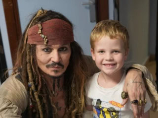Johnny Depp Dons Persona Of Jack Sparrow For Children In Paris Hospital