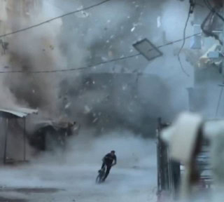 Palestinian Cyclist Narrowly Escapes Israeli Airstrike Debris In Viral Video From Gaza